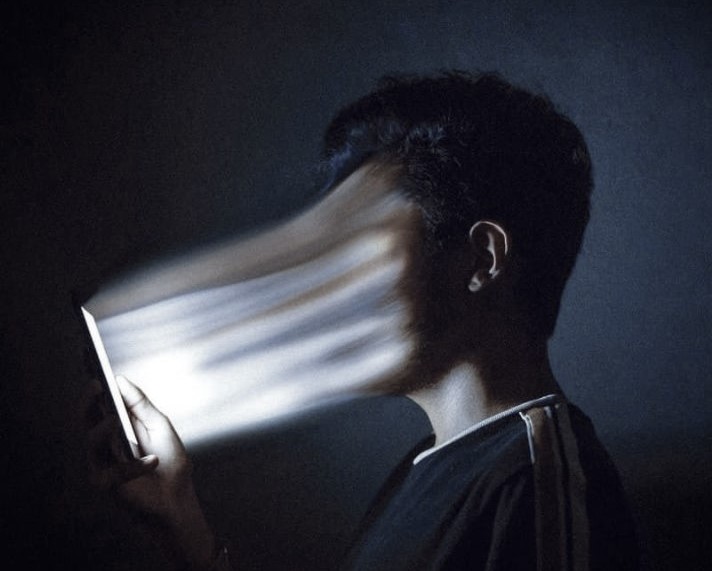 A person's face melting into the screen.